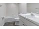 Cozy bathroom featuring a tub/shower combination with a bright vanity at 21550 Clubside Loop, Lutz, FL 33549