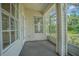 Enclosed screened patio with access to backyard at 21550 Clubside Loop, Lutz, FL 33549