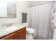 Clean bathroom with granite countertop and shower/tub combo at 2633 Edgewater Falls Dr, Brandon, FL 33511