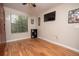 Bright bedroom with wood flooring and a window with blinds at 2633 Edgewater Falls Dr, Brandon, FL 33511