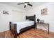 Bedroom with full-size bed, desk, and ceiling fan at 2633 Edgewater Falls Dr, Brandon, FL 33511