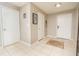 Bright entryway with tile flooring and access to interior rooms at 2633 Edgewater Falls Dr, Brandon, FL 33511