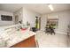 Kitchen features granite countertops, stainless steel appliances, and breakfast nook at 2633 Edgewater Falls Dr, Brandon, FL 33511