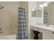 Bathroom with shower/tub combo and updated vanity at 2749 Via Cipriani # 1032A, Clearwater, FL 33764