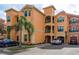 Grand Bellagio building exterior with parking and landscaping at 2749 Via Cipriani # 1032A, Clearwater, FL 33764