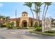 Grand Bellagio community entrance with palm trees and a gated entrance at 2749 Via Cipriani # 1032A, Clearwater, FL 33764
