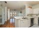 Updated kitchen, stainless steel appliances, and white cabinets at 2749 Via Cipriani # 1032A, Clearwater, FL 33764