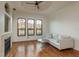 Spacious living area with hardwood floors and large windows at 2749 Via Cipriani # 1032A, Clearwater, FL 33764