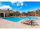Large community pool with plenty of lounge chairs at 2749 Via Cipriani # 1032A, Clearwater, FL 33764