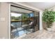 Enclosed balcony overlooking a serene water view, offering a tranquil outdoor space at 6388 93Rd N Ter # 4603, Pinellas Park, FL 33782
