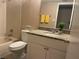 Bright bathroom featuring granite countertops and a shower/tub combo at 6388 93Rd N Ter # 4603, Pinellas Park, FL 33782