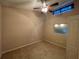 Bedroom with neutral walls, ceiling fan, and carpet flooring at 6388 93Rd N Ter # 4603, Pinellas Park, FL 33782