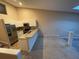 A well-lit kitchen features granite countertops, stainless steel appliances, and modern cabinets at 6388 93Rd N Ter # 4603, Pinellas Park, FL 33782