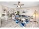 Inviting living room with vaulted ceilings and hardwood floors at 6388 93Rd N Ter # 4603, Pinellas Park, FL 33782