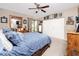 Bedroom featuring a ceiling fan, a large closet and sliding glass door to a small porch at 6388 93Rd N Ter # 4603, Pinellas Park, FL 33782