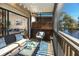 Outdoor porch with wicker furniture and a view of the water at 6388 93Rd N Ter # 4603, Pinellas Park, FL 33782