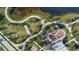 Aerial view of community park with walking trails, playground, and dog park at 7506 Parkshore Dr, Apollo Beach, FL 33572