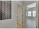 Bright hallway with access to bathroom and bedroom at 7506 Parkshore Dr, Apollo Beach, FL 33572