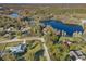 Aerial view showing home's location near lake at 905 Lake Fuller Dr, Lutz, FL 33548