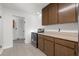 Updated kitchen with stainless steel appliances and wood cabinets at 905 Lake Fuller Dr, Lutz, FL 33548