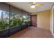 Spacious screened porch overlooking the lake at 905 Lake Fuller Dr, Lutz, FL 33548