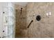 Large walk-in shower with tiled walls and built-in seat at 905 Lake Fuller Dr, Lutz, FL 33548