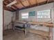 Workshop area with workbench and tools at 905 Lake Fuller Dr, Lutz, FL 33548