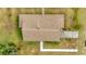 Overhead view of a single story home with brown roof and walkways at 9229 Fort King Rd Rd, Dade City, FL 33525