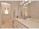 Clean bathroom with updated vanity and shower at 9229 Fort King Rd Rd, Dade City, FL 33525