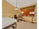 Cozy bedroom with a desk and built-in shelving at 9229 Fort King Rd Rd, Dade City, FL 33525