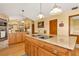 Island kitchen with granite countertops and stainless steel appliances at 9229 Fort King Rd Rd, Dade City, FL 33525