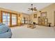 Spacious living room with French doors and a large window at 9229 Fort King Rd Rd, Dade City, FL 33525