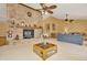Living room features a large brick fireplace and vaulted ceilings at 9229 Fort King Rd Rd, Dade City, FL 33525