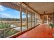 Relaxing screened porch with tile flooring and view of the backyard at 9229 Fort King Rd Rd, Dade City, FL 33525