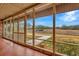 Spacious screened porch overlooking tranquil pastures at 9229 Fort King Rd Rd, Dade City, FL 33525