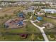 Community features a playground, pool, and ample green space at 10303 Charlotte Dr, Parrish, FL 34219
