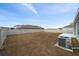 Large backyard with fenced perimeter and patio at 10303 Charlotte Dr, Parrish, FL 34219