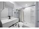 Clean bathroom with a walk-in shower and modern vanity at 10303 Charlotte Dr, Parrish, FL 34219