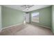 Light and airy bedroom with access to the backyard at 10303 Charlotte Dr, Parrish, FL 34219