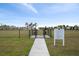 Dog park with fenced area and waste disposal stations at 10303 Charlotte Dr, Parrish, FL 34219