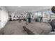 State-of-the-art gym with various equipment and TV screens at 10303 Charlotte Dr, Parrish, FL 34219
