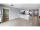 Modern kitchen features a breakfast bar and stainless steel appliances at 10303 Charlotte Dr, Parrish, FL 34219