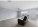 Spacious living room with tile flooring and large window at 10303 Charlotte Dr, Parrish, FL 34219
