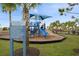 playground with slides, climbing structures, and shade at 10303 Charlotte Dr, Parrish, FL 34219