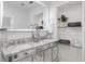 Modern bathroom with double vanity and marble countertop at 2003 W Dekle Ave, Tampa, FL 33606