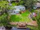 House, large backyard, dock and garden beds by the water at 20735 Gardenia Dr, Land O Lakes, FL 34638