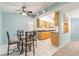 Charming kitchen with a breakfast nook and light wood cabinets at 20735 Gardenia Dr, Land O Lakes, FL 34638