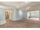 Spacious living area with light blue walls and carpet at 20735 Gardenia Dr, Land O Lakes, FL 34638