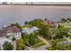 Waterfront home with lush landscaping and a private drive at 334 Blanca Ave, Tampa, FL 33606
