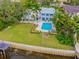 Luxury waterfront home with a pool, spa, large yard and private dock at 334 Blanca Ave, Tampa, FL 33606